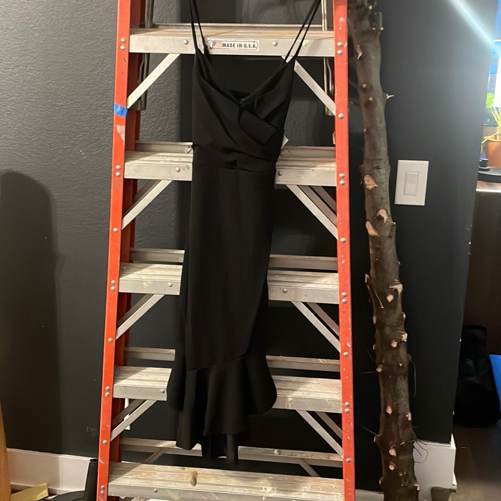 Black ruffle hem to knee dress